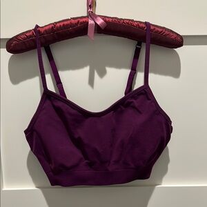 Athleta sports bra, sz SM; color is a beautiful wine. Adjustable straps